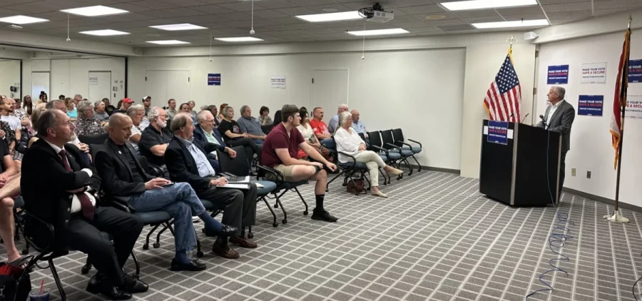 Republican National Committee chair Michael Whatley speaks to a room of volunteers at the Ohio Republican Party's headquarters in Columbus