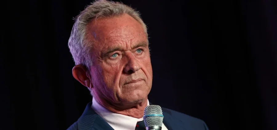 Independent presidential candidate Robert F. Kennedy Jr. holds a microphone.