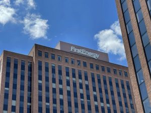 A high-rise office building with the name "FirstEnergy" at the top.