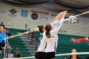 Bulldogs Mabel Monday and Maeve Schwarzel go up for a block