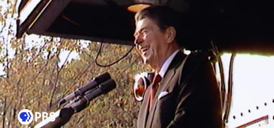 President Reagan speaking from what appears to be the caboose of a train