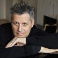 A promotional image of Isaac Mizrahi.