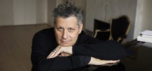 A promotional image of Isaac Mizrahi. 