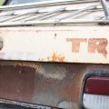 The name is faded but still visible on the trunk of Chris Schermacher's 1980 Triumph TR8.