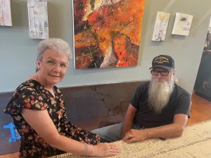 Donna Cordell (L) and Bill Myers (R) sit at a coffee shop in Mansfield, OH.