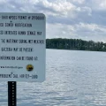 A sign at a beach in Toledo warns people about the risk of harmful bacteria like algal blooms in Lake Erie.