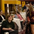 Students present to a large crowd of visitors in the gymnasium of Federal Hocking High School.