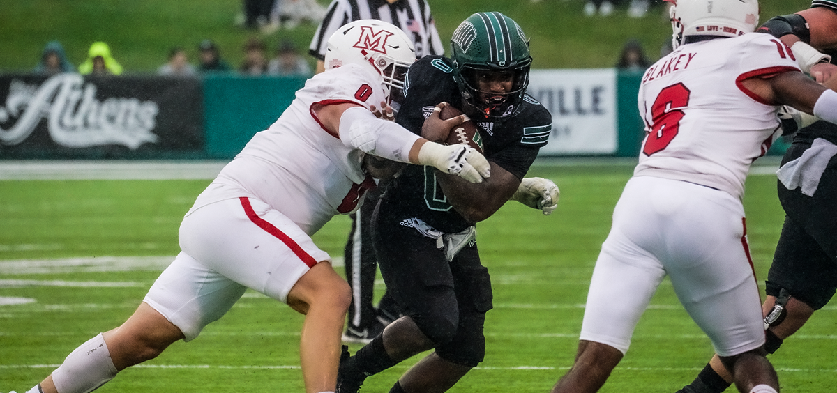 Ohio's O'Shaan Allison is tackled against Miami on Oct. 28, 2023.