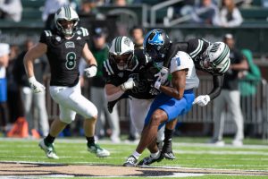 Ohio's defense sacks Buffalo quarterback C.J. Ogbonna. 