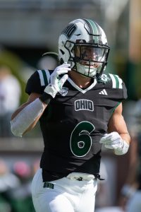 Coleman Owen walking the sideline during his stand-out showing vs Buffalo.