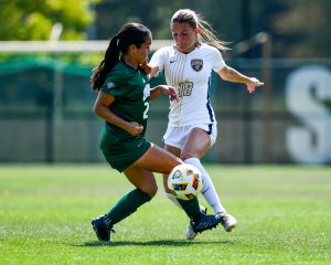 Hailey Jeng battling for the ball against Oakland.