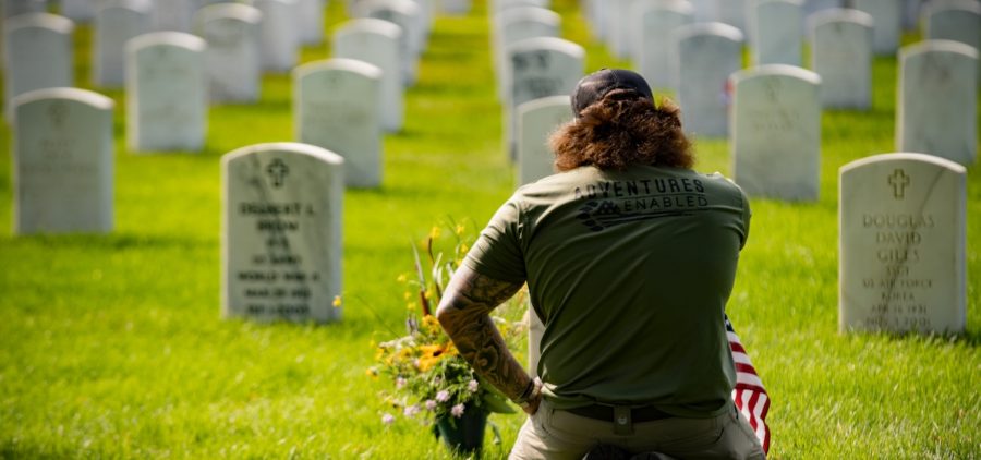 Credit: Jesse Larvick for XVII Films Archive Anthony Marquez reflecting at the grave of his friend, LCpl. Robert Greniger.