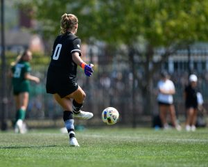 Sloma kicking the ball from the goal box vs Oakland.