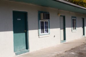 A row of motel room doors.