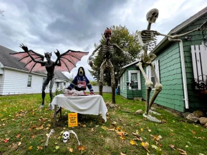 A stop along Fairfield County's trail of scarecrows shows a scarecrow operating on a zombie.