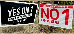 Signs for and against Ohio Issue 1, a redistricting reform proposal, adorn lawns in Central Ohio.