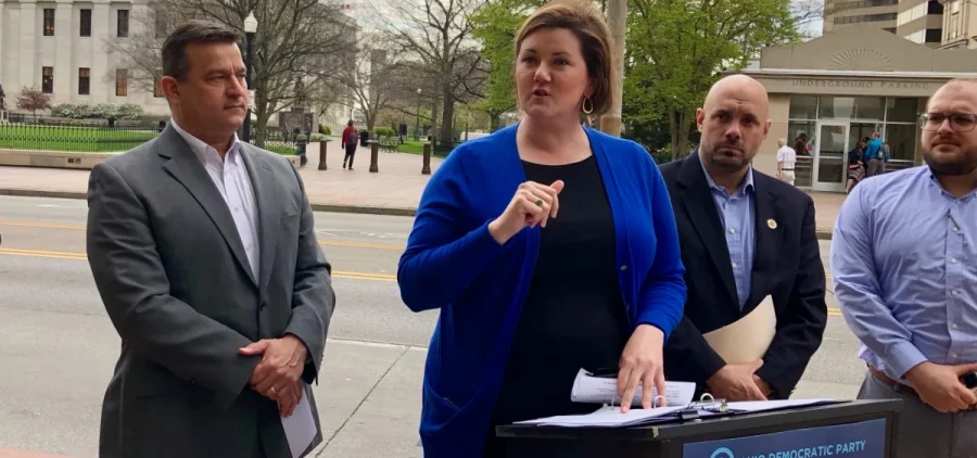 Liz Walters, Ohio Democratic Party chair, with candidates for statewide office outside the Ohio Statehouse in April 2022