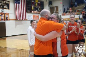 Buckeye setter Megan Booth hugs Head Coach Wayne Dicken