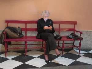 Former House Speaker Jo Ann Davidson sits on a bench at the Statehouse in 2017.