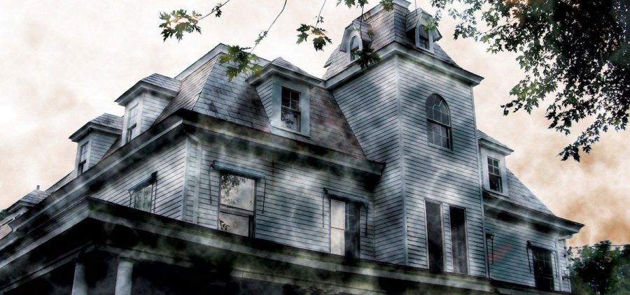 an old Victorian style home, photographed to look eerie.