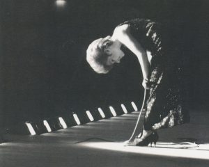 Brenda taking her signature bow on stage at the end of a performance. Credit: Brenda Lee Productions