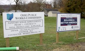 Signs on Converse Street in Chauncey announce the project to replace the village's sewer system.