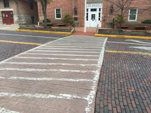 The crosswalk between Athens City Hall and the parking garage.