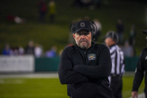 Ohio head coach Tim Albin walking on the sideline vs Eastern Michigan.