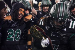 Tank Pearson (#7) holding Ohio's turnover belt after recording an interception vs Eastern Michigan.