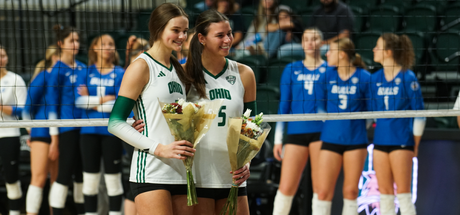 Makenna Schafer (#5) and Elizabeth Hoerlein (#7) are honored pregame for senior day.