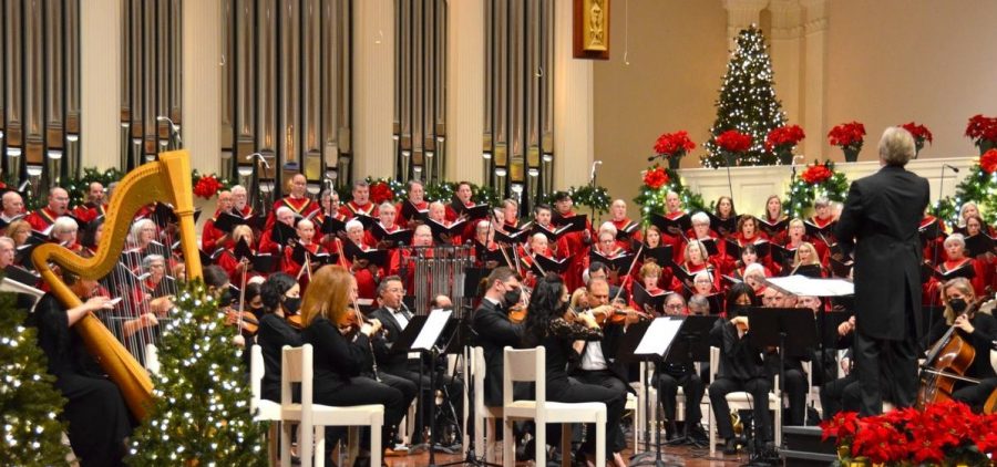 wide shot of orchestra, chorus in large church setting