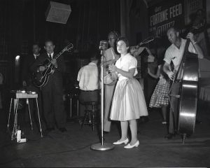 Young Brenda singing on stage with the A- Team. Credit: Elmer Williams