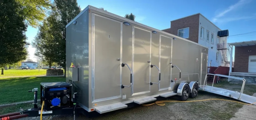 The Soap-n-Hope Mobile Hygiene Unit parked outside.