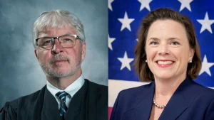 Justice Michael Donnelly on the left and Judge Megan Shanahan on the right