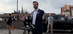 Republican vice presidential candidate US Sen. JD Vance talks to reporters after voting at a church in Cincinnati on Nov. 5, 2024.