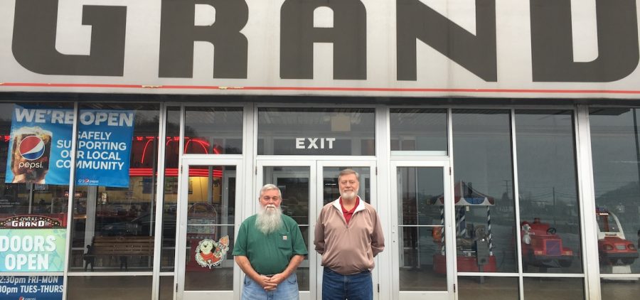 Athena Grand co-owners Rick Frame and Mike Little stand outside the theater in Athens.