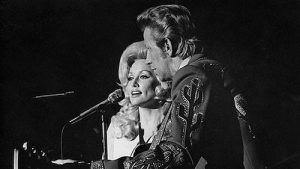 Dolly Parton and Porter Wagoner performing a duet