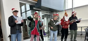 Environmental activists from the group Save Ohio Parks came in holiday costumes to the Oil and Gas Land Management Commission meeting, singing revised Christmas carols with lyrics related to fracking.