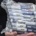 Patient Lory Osborn holds a bag of Wegovy pens used in her treatment at the Medical Weight Management office at West Virginia University in Morgantown, W.Va.