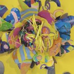 Close up of Passion Works Flower with yellow, orange, pink and blue colors.