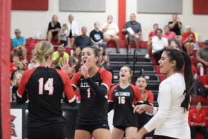 Spartan Meena Juedes celebrates a kill with her teammates
