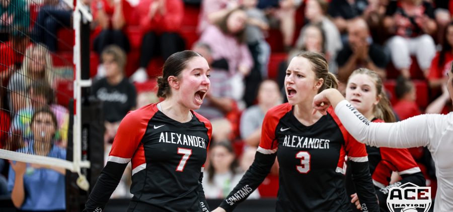 Spartans Maddy Penrod and Macie Hubbard celebrate a point