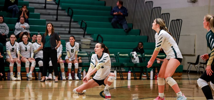 Bulldog Emma Meili receives serve