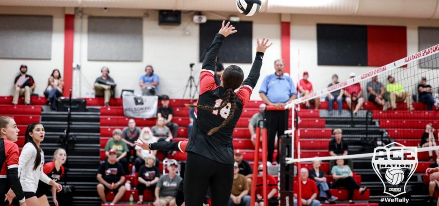 Spartan Laney Douglas sets the ball