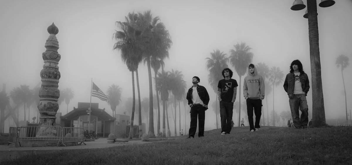 A black and white photo of the band Chained Saint.
