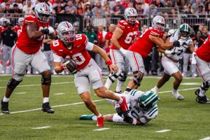 Ohio defensive lineman Anus Luqman tripping up OSU quarterback Julian Sayin.