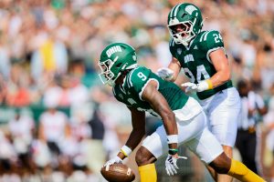 Mike Mack II (9) celebrating after recording his first interception of the season vs GWU.