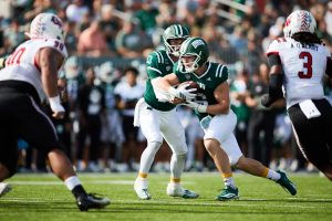 Ohio Football QB Parker Navarro (13) handing the ball off to Duncan Brune in the Bobcats 52-35 win over Gardner-Webb.