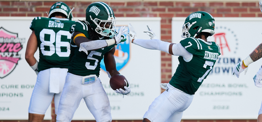 Sieh Bangura (5) and Chase Hendricks (7) celebrating Bangura's 3rd rushing TD vs Gardner-Webb.