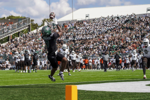 Chase Hendricks jumping to catch a touchdown pass from Parker Navarro.